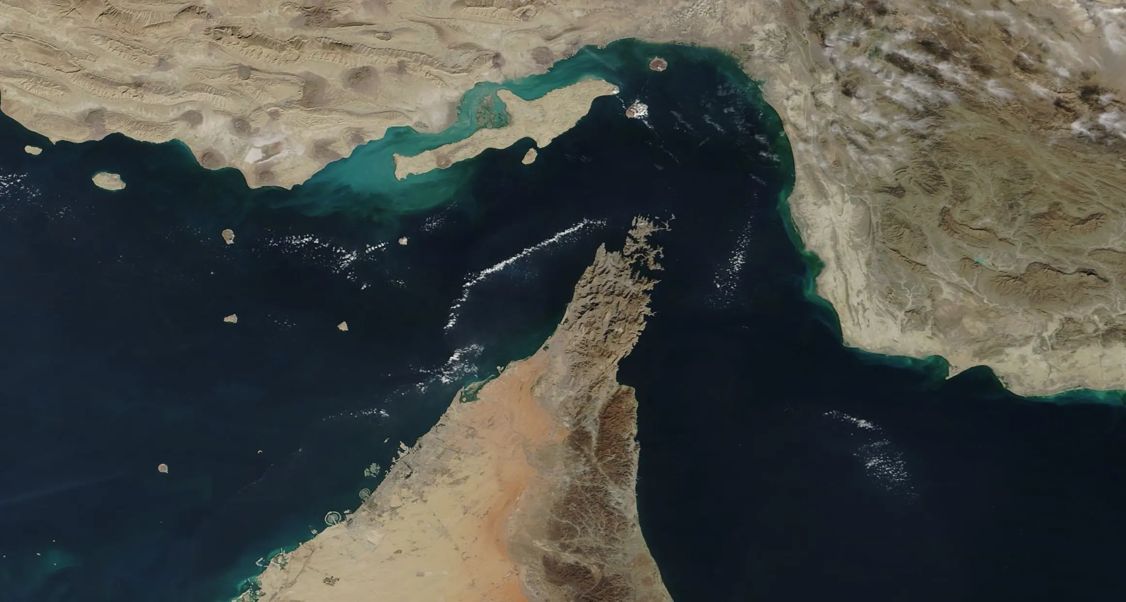 When will commercial shipping through the Strait of Hormuz resume?